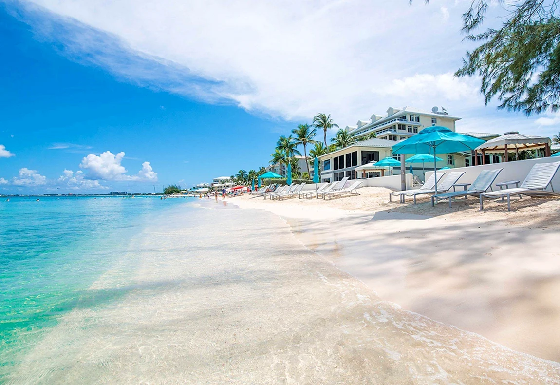 Cayman islands vs antigua. Seven Mile Beach острова Кайман. Джорджтаун (острова Кайман). Джорджтаун Гранд Кайман. Большой Кайман Каймановы острова.